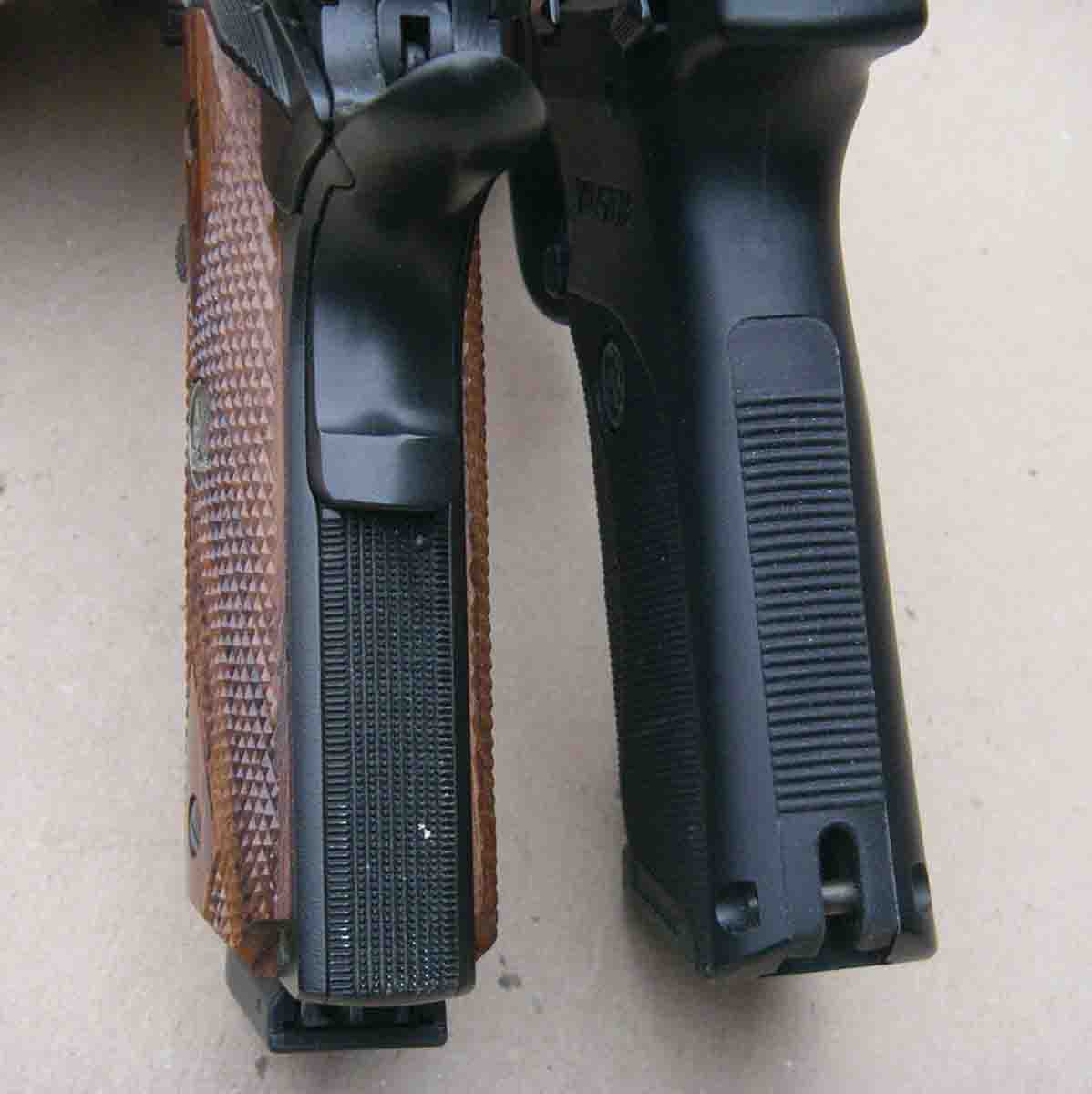 The Ruger SR40 (right) features an unusually thin grip when compared with other high-capacity pistols. For comparison, it is shown next to a Wilson Combat Model 1911.